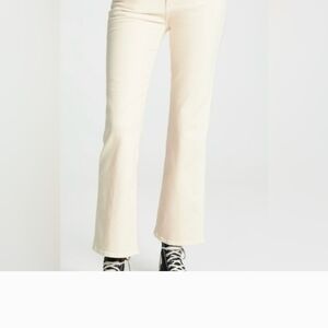 KHAITE Ivory Denim with Black and Gold Button.